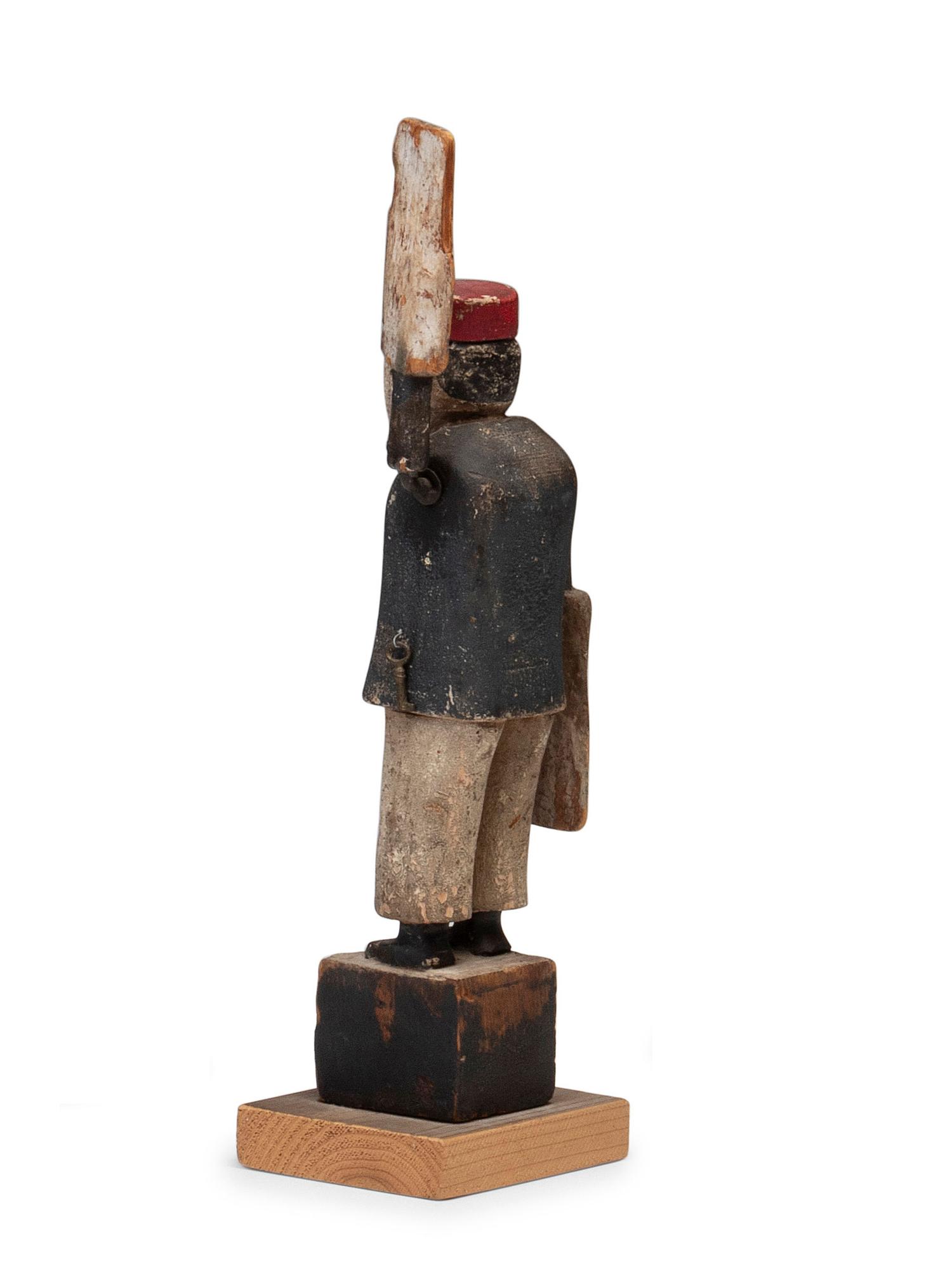 A Carved and Painted Wood Whirligig