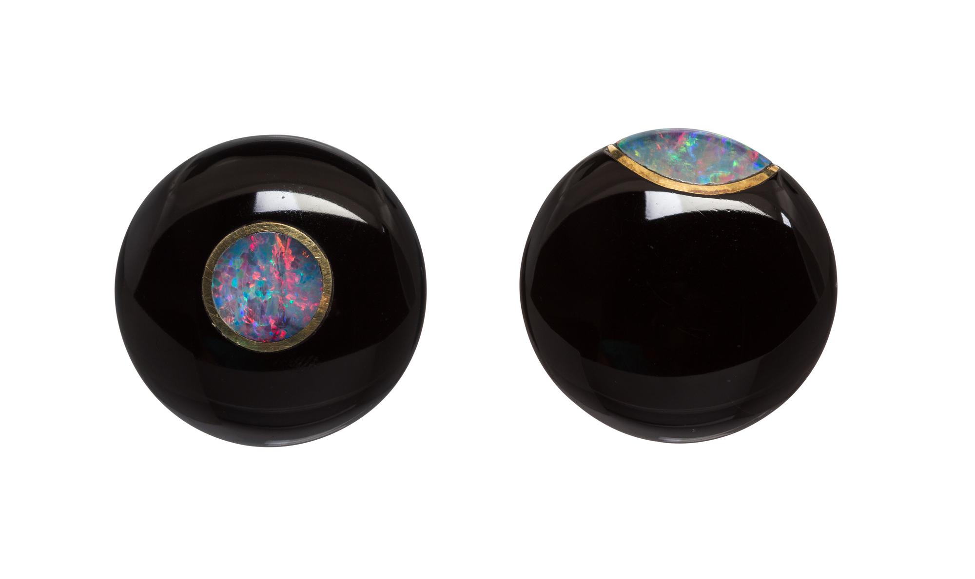 A Pair of 14 Karat Yellow Gold, Onyx and Opal Earclips, 17.10 dwts.