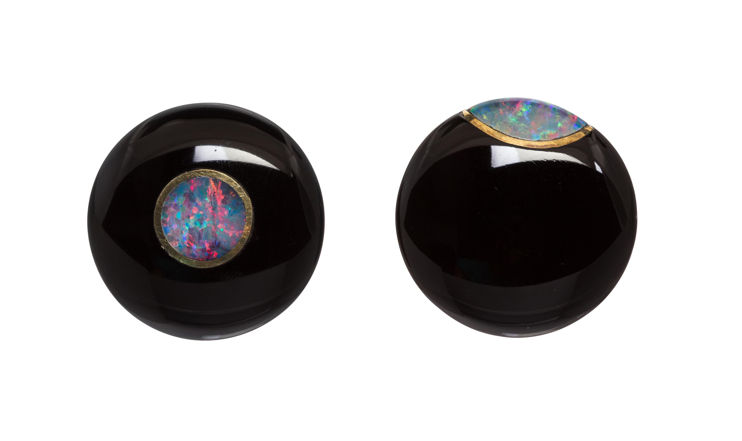 A Pair of 14 Karat Yellow Gold, Onyx and Opal Earclips, 17.10 dwts.