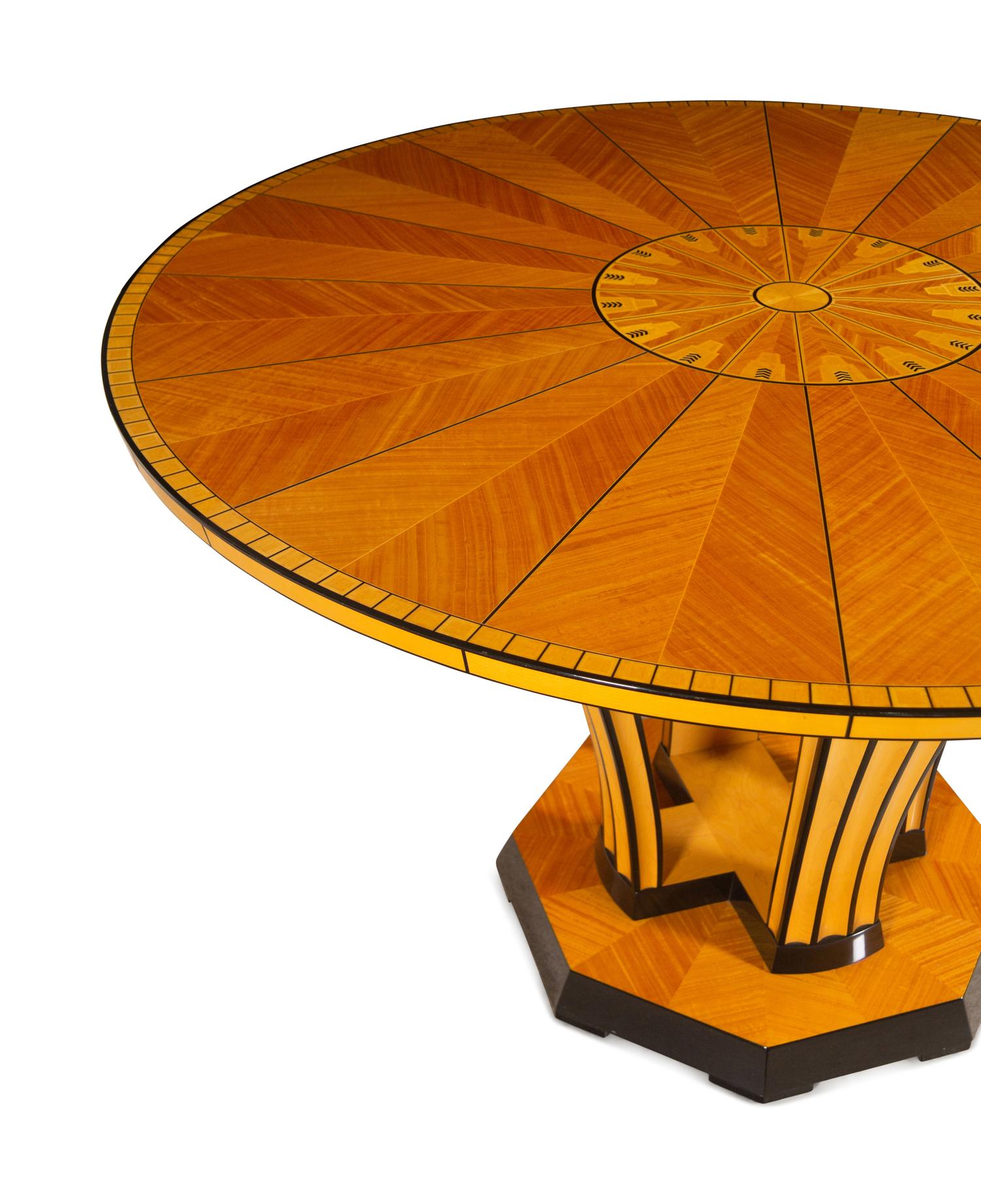A Part-Ebonized Birch Dining Set