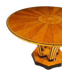 A Part-Ebonized Birch Dining Set