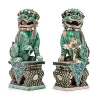 A Pair of Chinese Famille Verte Porcelain Figures of Fu Lions