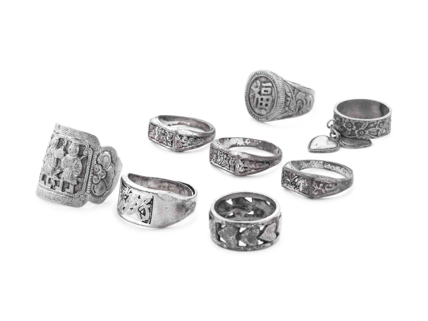 Eight Chinese Silver and Metal Rings