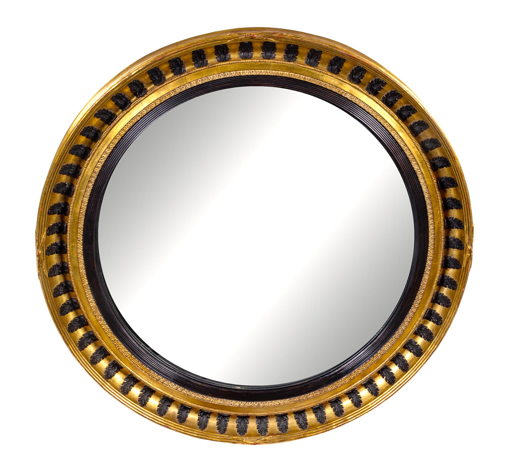 A Regency Style Parcel Ebonized Giltwood Mirror Diameter 45 1/2 inches. — PROBABLY LATE 19TH CENTURY