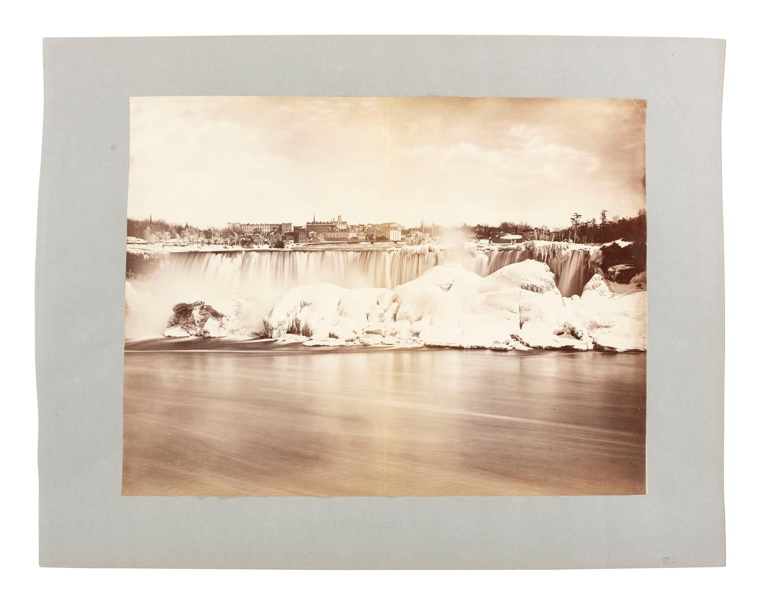 Niagara Falls [BARKER, George (1844-1894), photographer]. Mammoth plate albumen photograph of Niagara Falls in winter. Ca 1860s.