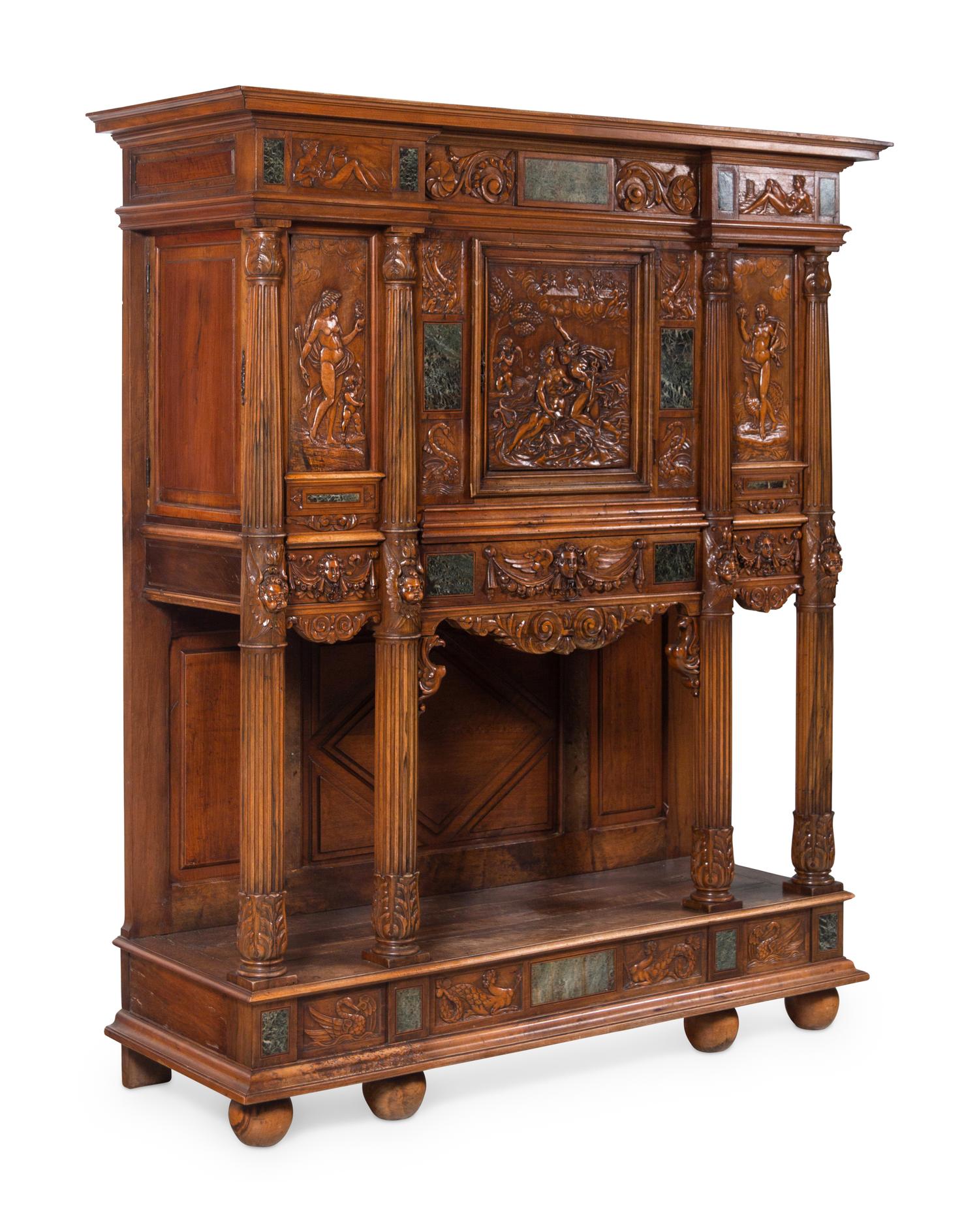 A French Renaissance Revival Carved Walnut and Marble-Inset Court Cupboard