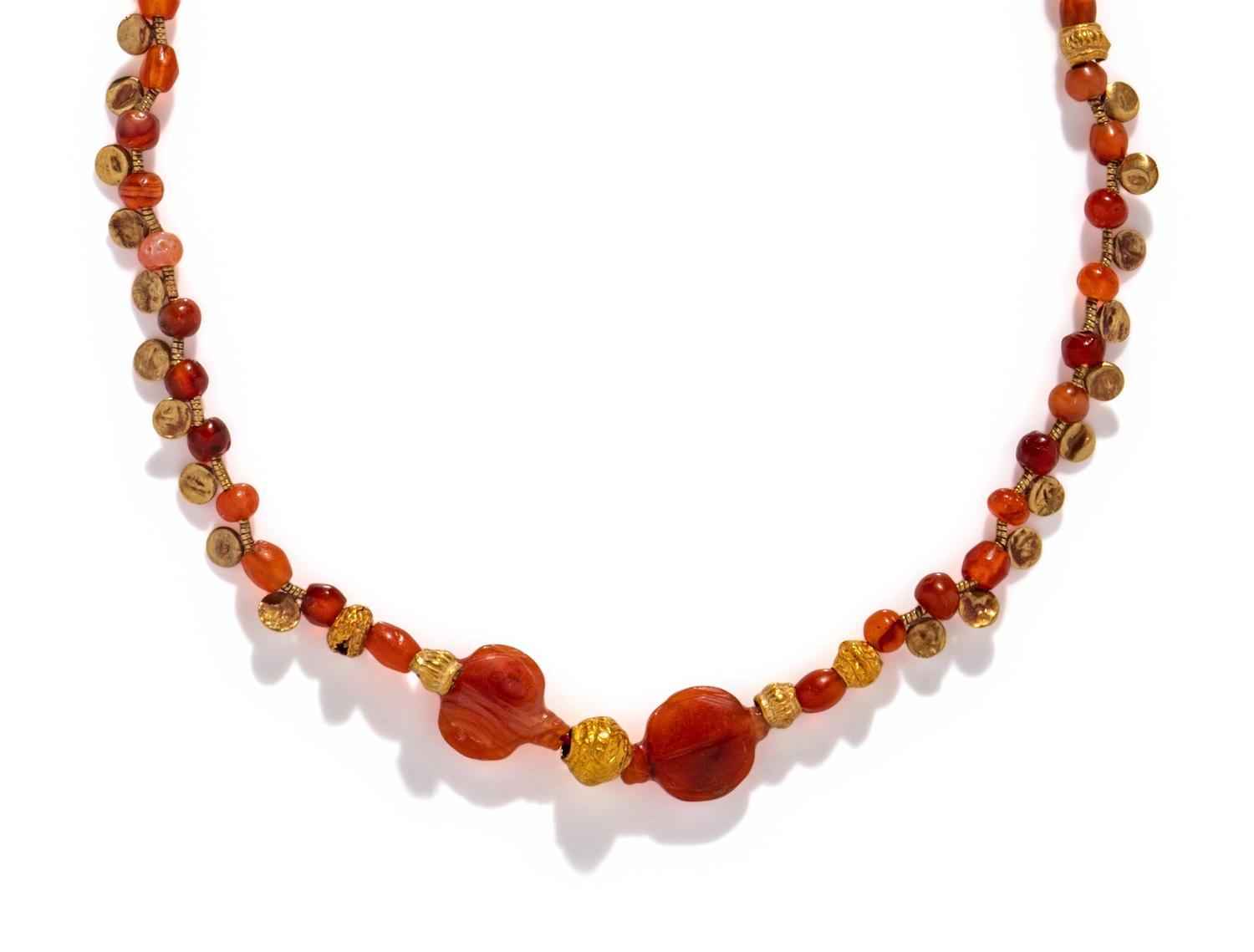An Islamic Carnelian and Gold Bead Necklace