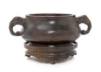 A Chinese Bronze Tripod Elephant Handled Censer Diameter 12 inches. — 20TH CENTURY