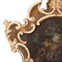 An Italian Floral Painted Panel in a Painted and Parcel Gilt Rococo Frame