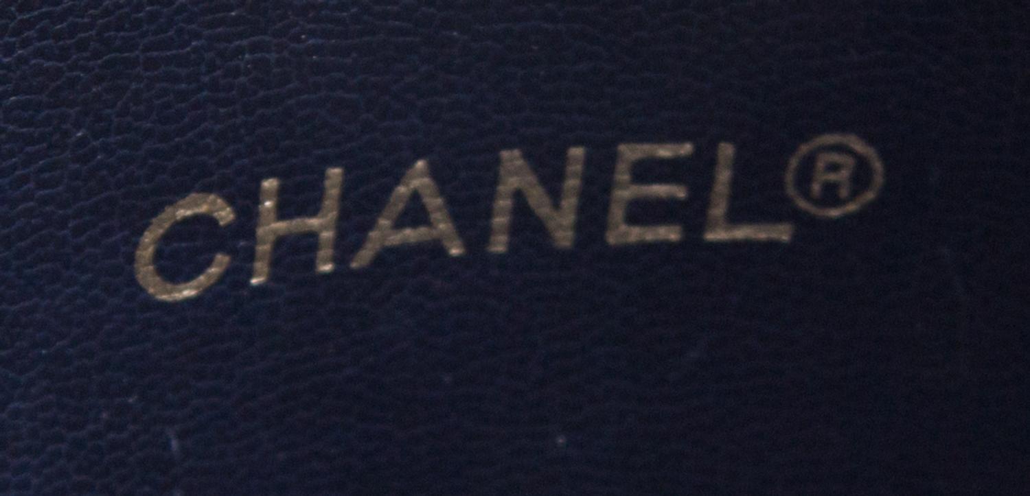 A Chanel Navy Leather Quilted Tote Handbag, 12.5" x 10" x 4".