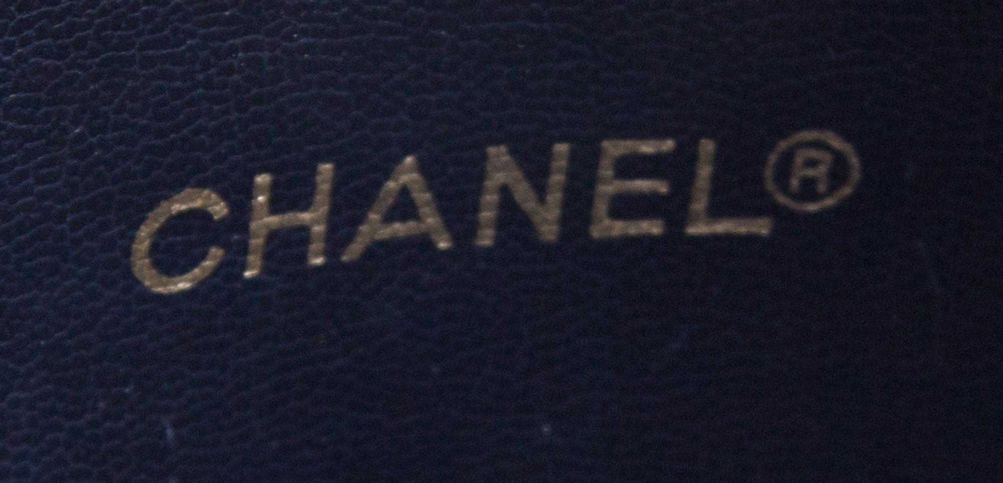 A Chanel Navy Leather Quilted Tote Handbag, 12.5" x 10" x 4".
