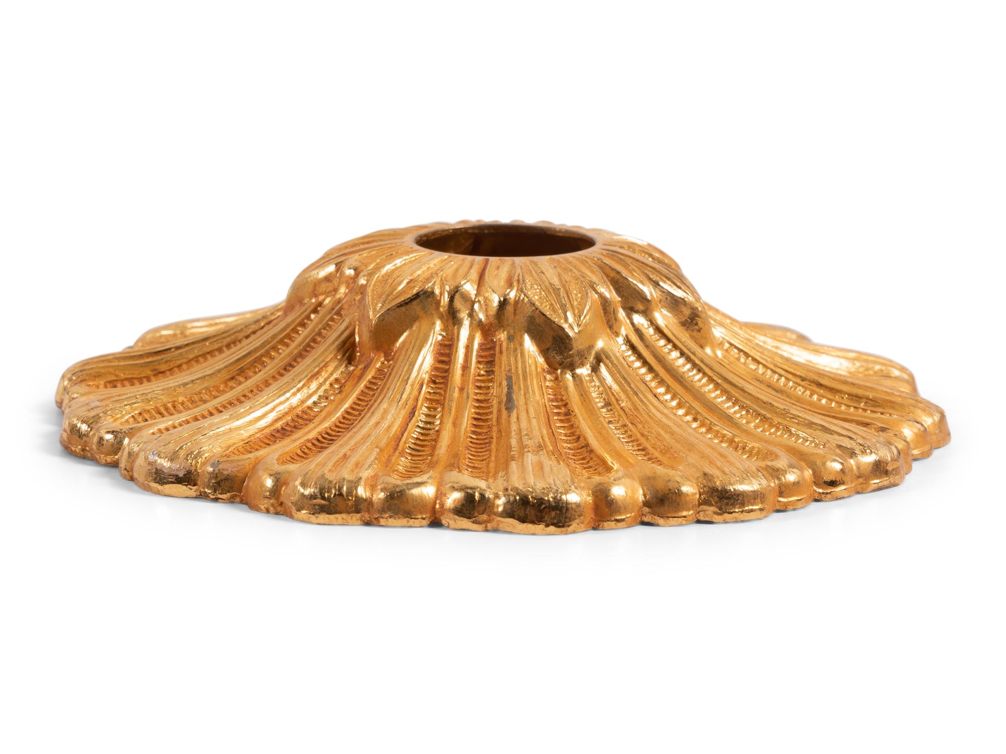 An Empire Style Gilt Bronze Twelve-Light Chandelier