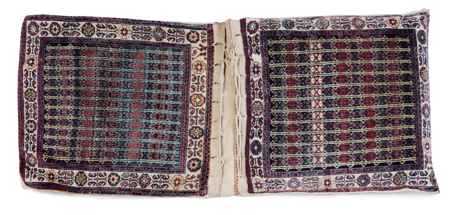 A Northwest Persian Saddle Bag 4 feet 5 inches x 1 foot 11 inches. — FIRST HALF 20TH CENTURY