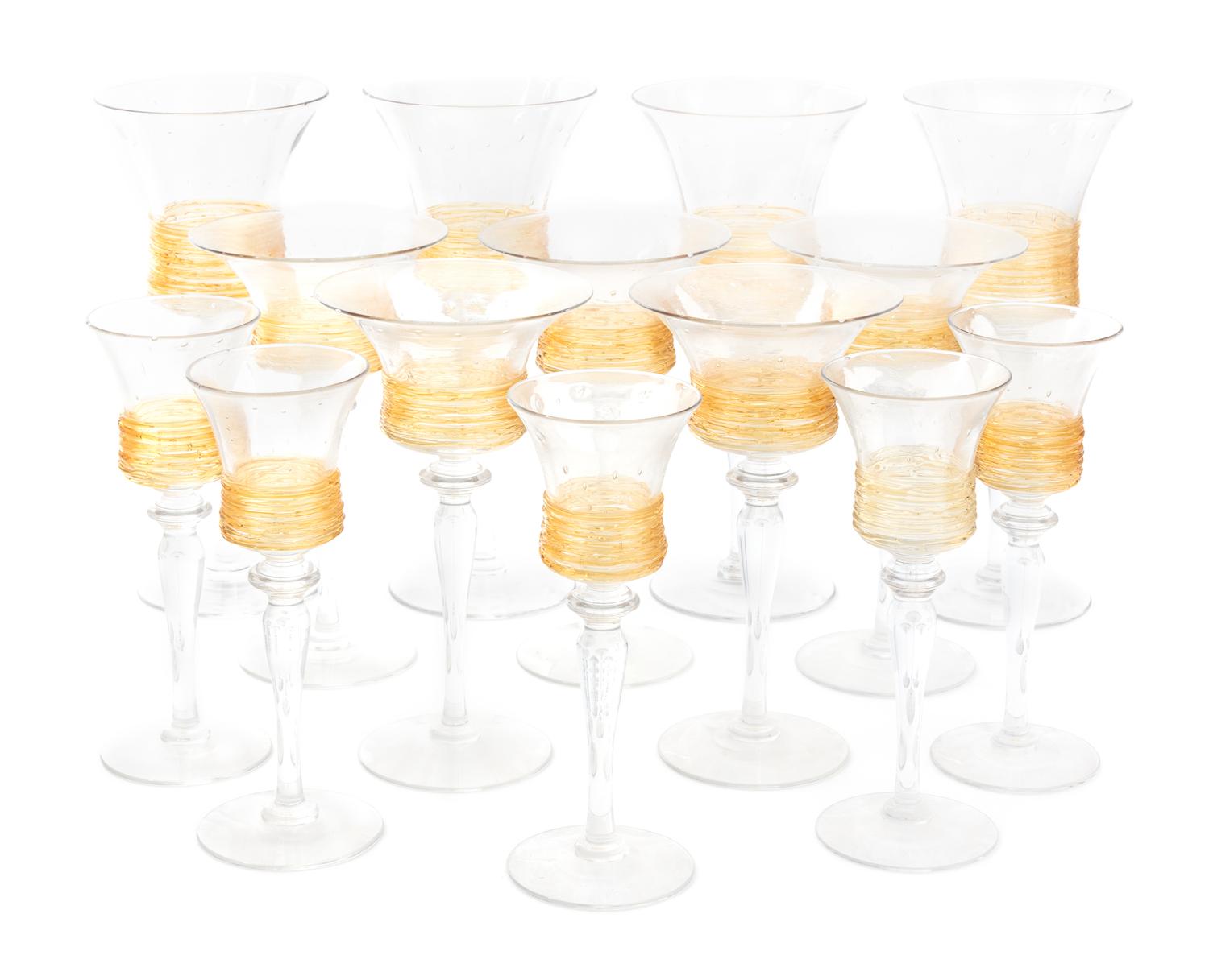A Steuben Glass Stemware Service Height of wine stems 9 inches.