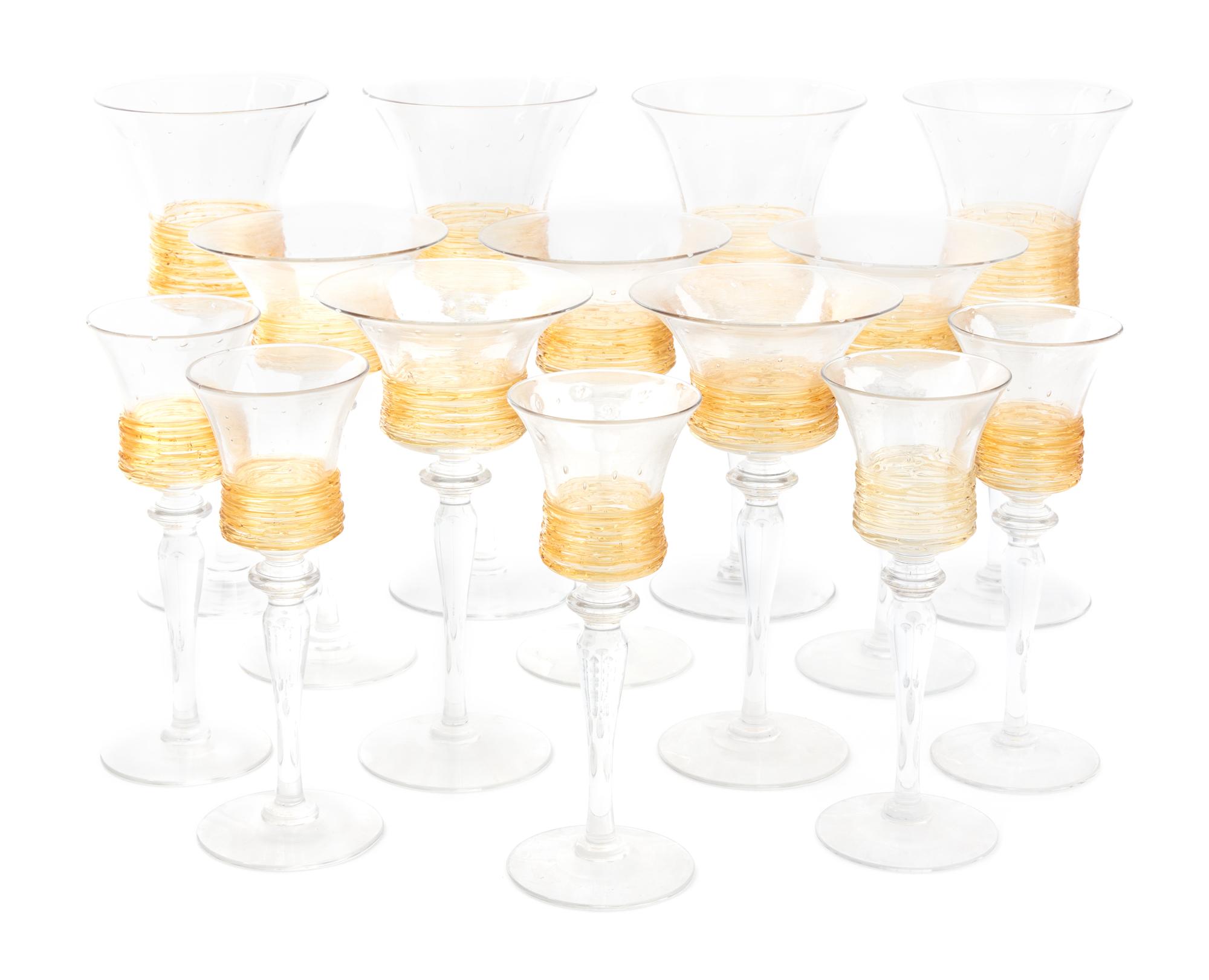 A Steuben Glass Stemware Service Height of wine stems 9 inches.