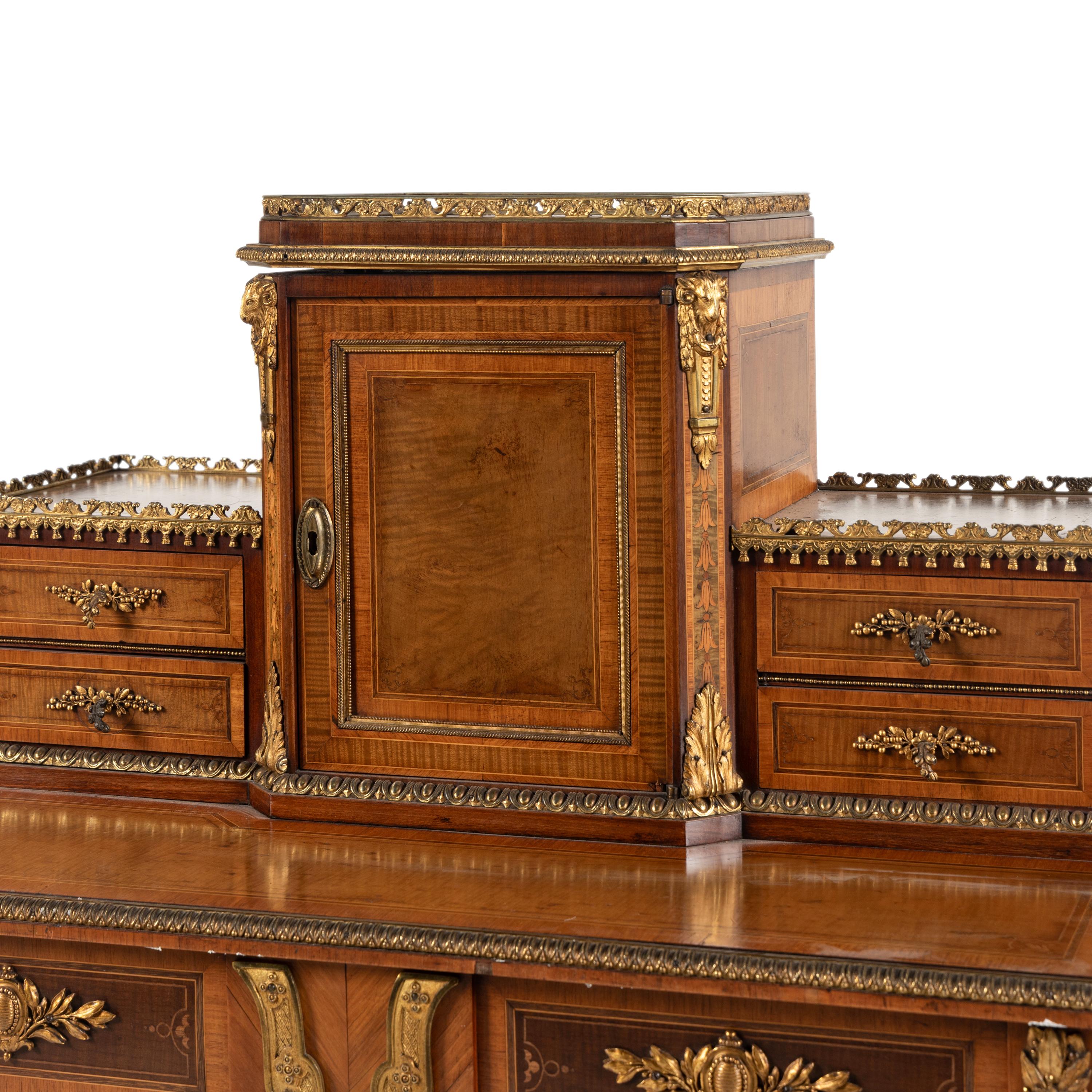A Louis XVI Style Kingwood, Satinwood and Gilt Bronze Mounted Bonheur du Jour