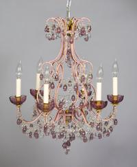 A Crystal Six-Light Chandelier, Height 24 1/2 inches, diameter 20 3/4 inches.