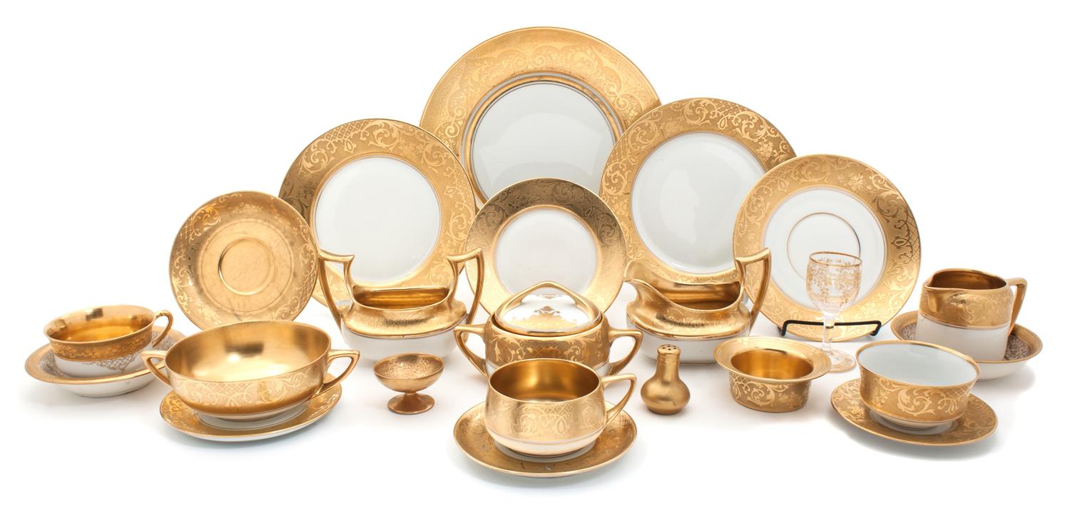 An Assembled Gilt Porcelain Dinner Service Diameter of dinner plate 11 inches.
