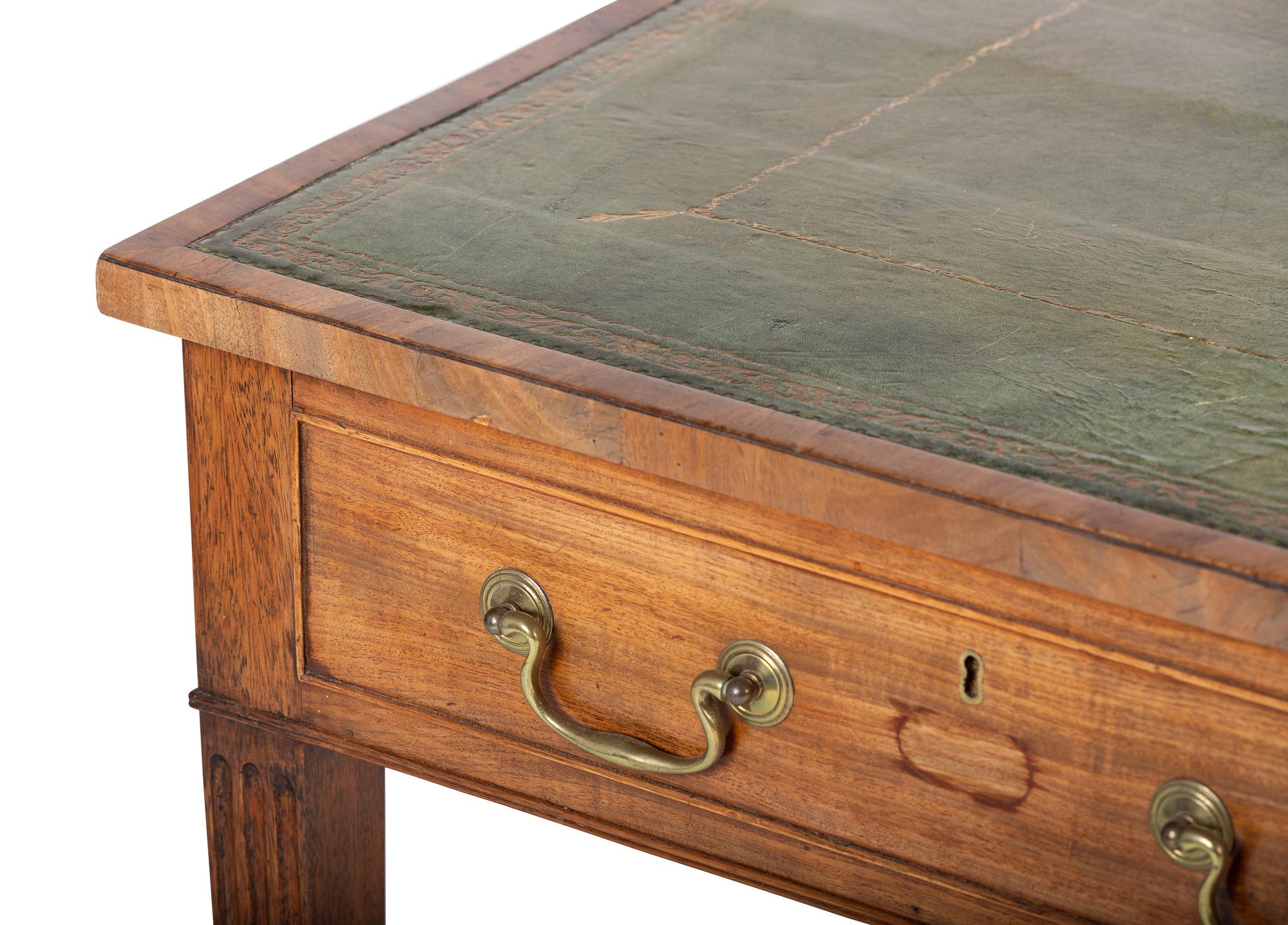 An English Mahogany Leather Inset Writing Table
