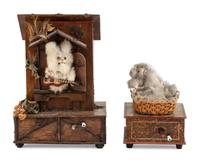 Two Manivelle Automata of Cats