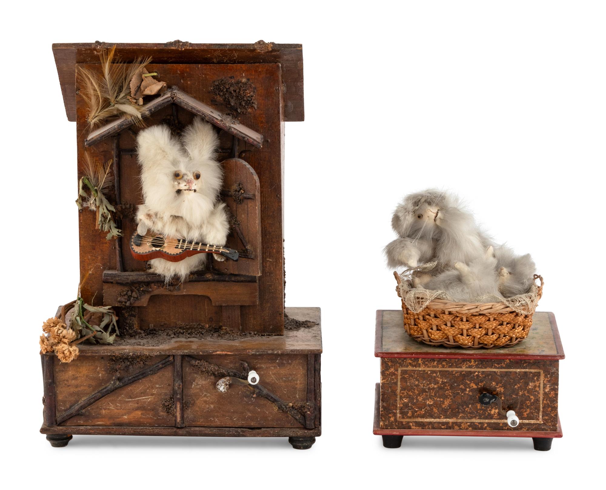 Two Manivelle Automata of Cats