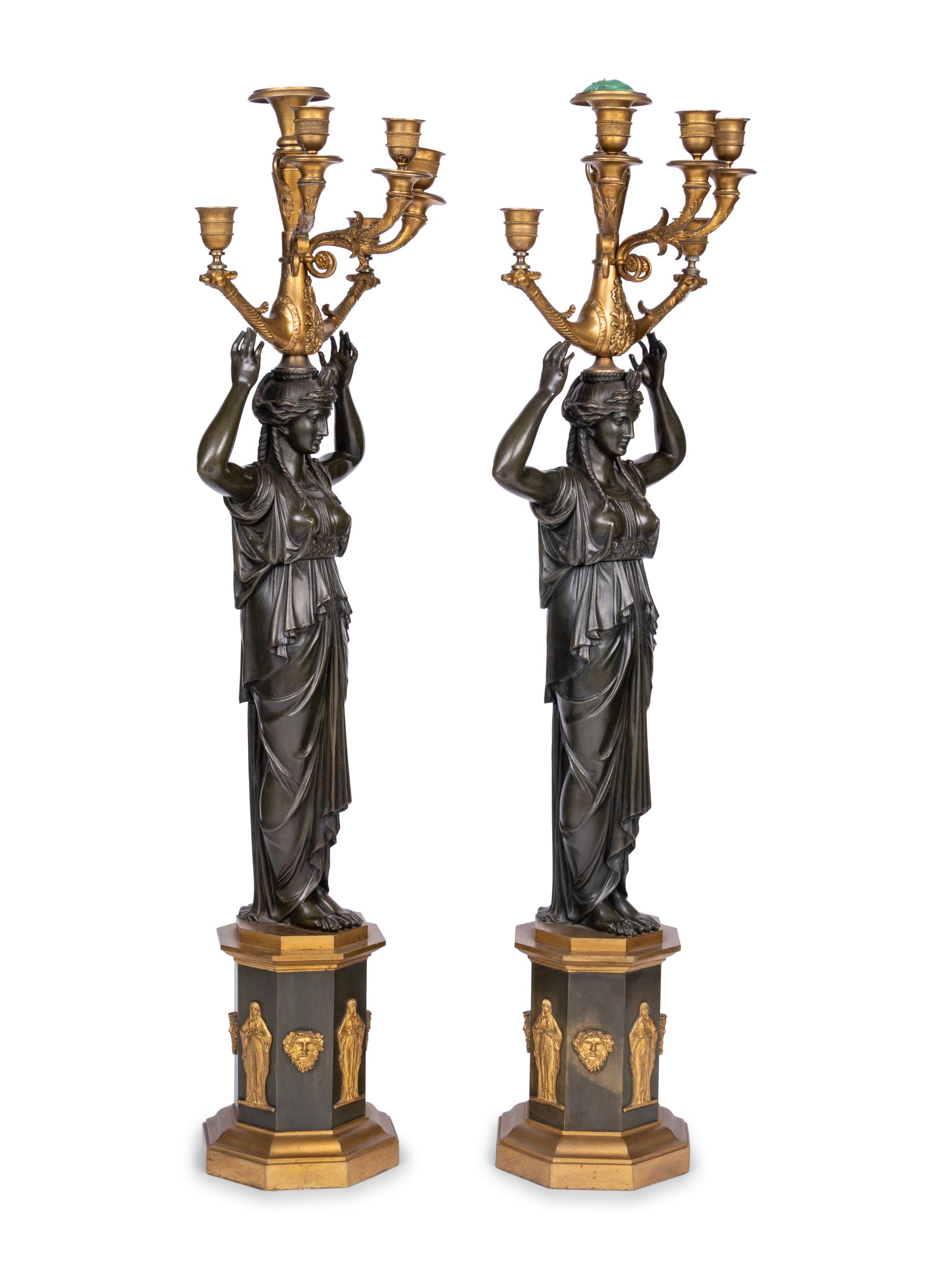 A Pair of Empire Style Gilt and Patinated Bronze Six-Light Figural Candelabra