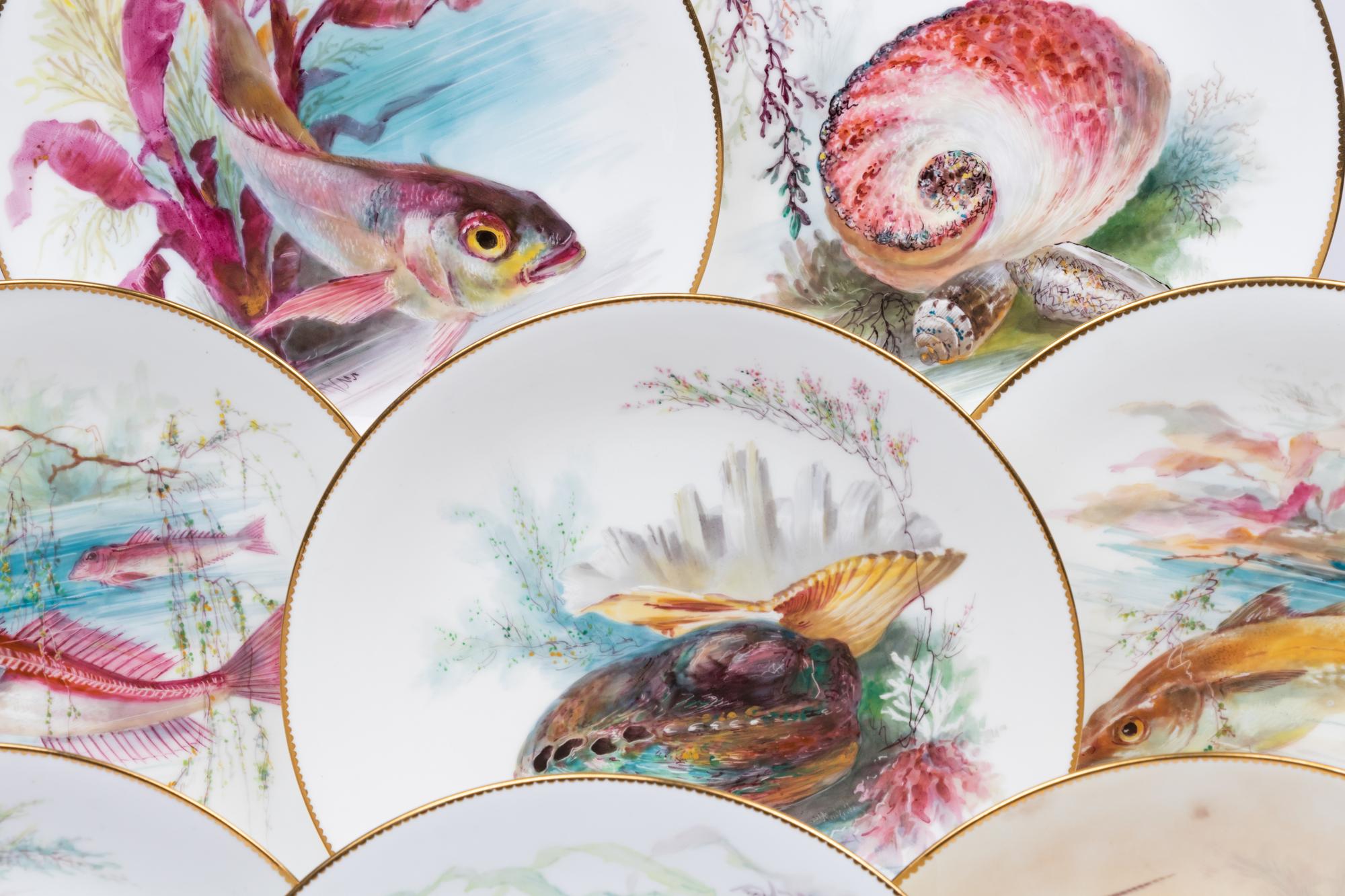 A Set of Twelve Mintons Parcel-Gilt Porcelain Fish and Shell Plates