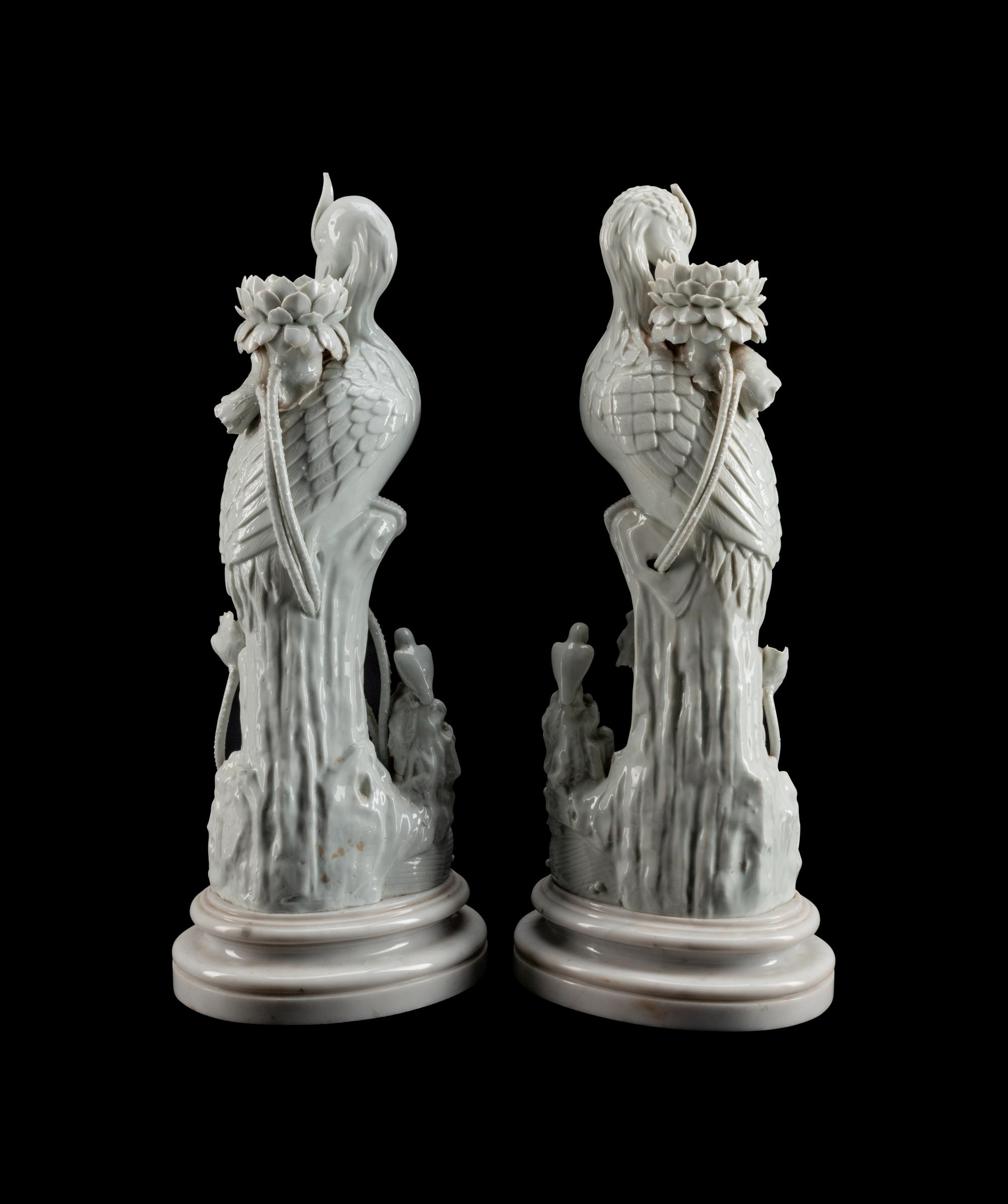 A Pair of Chinese Blanc de Chine Porcelain Crane-Form Candlesticks