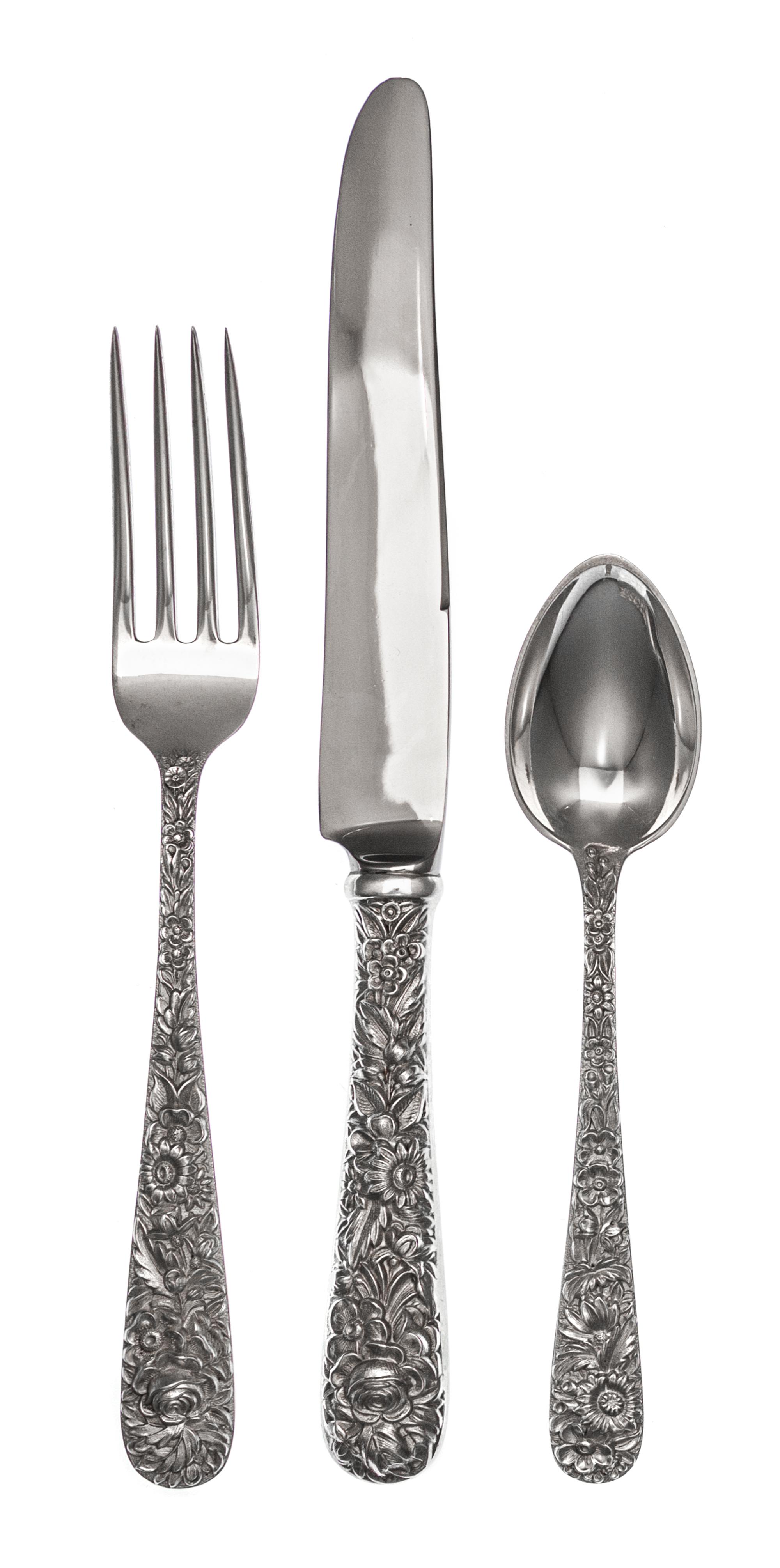 An American Silver Flatware Service, S. Kirk & Son., Baltimore, MD, 20th Century, Repousse pattern, comprising: 18 dinner knives 18 din