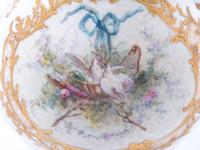A Sèvres Painted and Parcel Gilt Porcelain Creamer