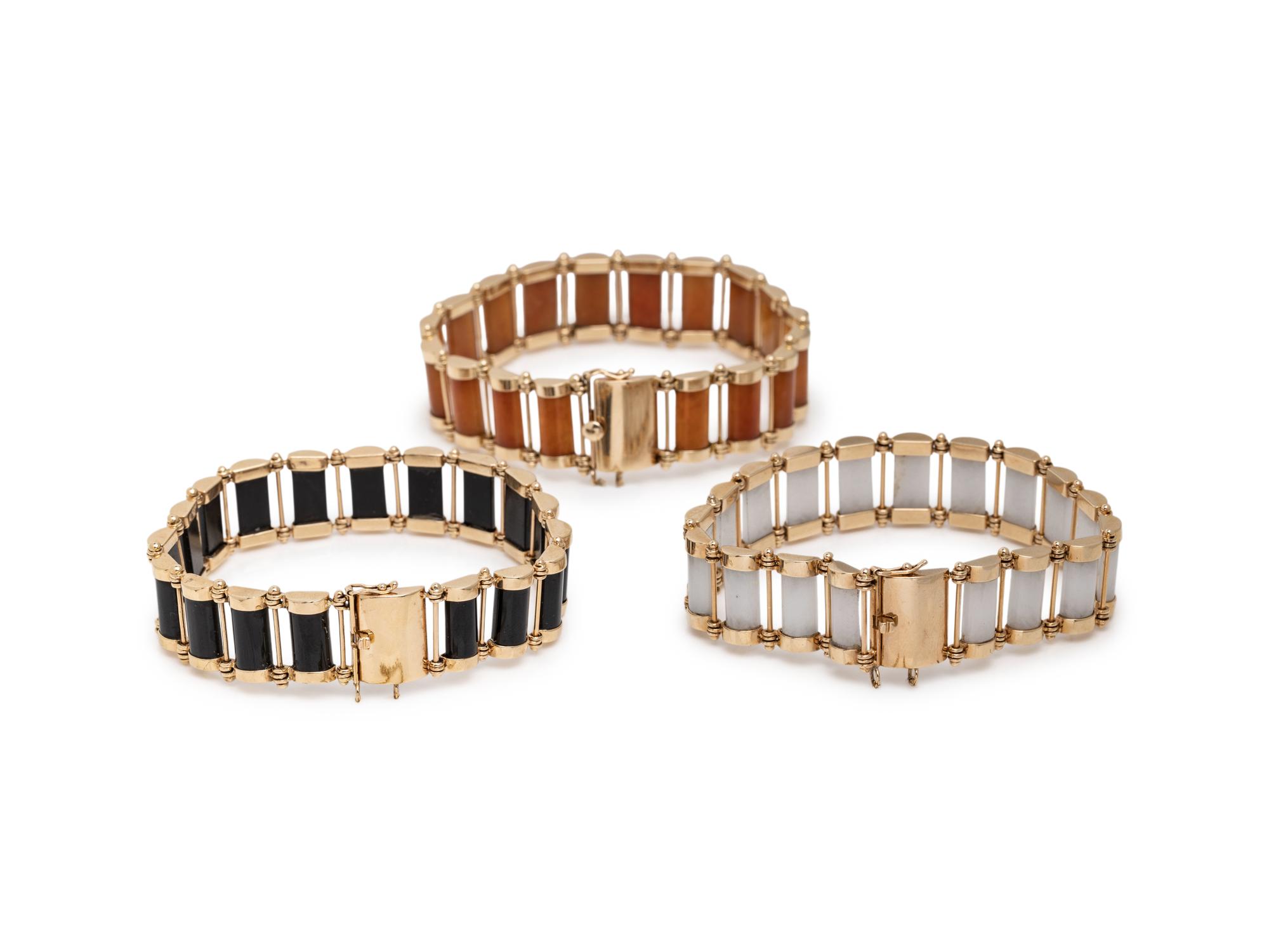 COLLECTION OF YELLOW GOLD AND JADE BRACELETS