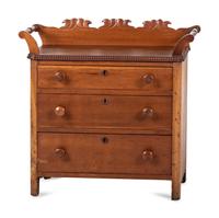 A Victorian Carved Cherrywood Diminutive Chest of Drawers
