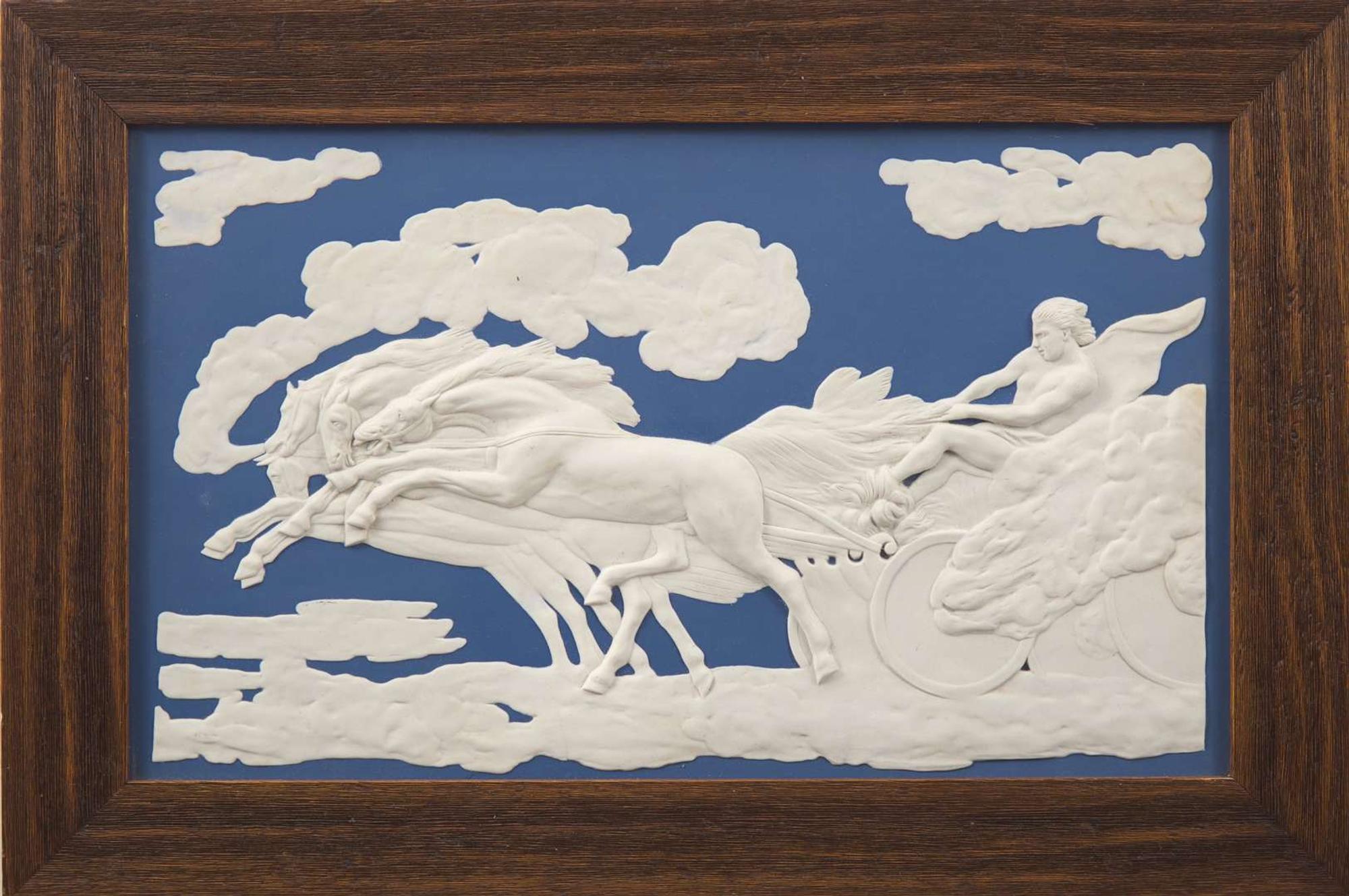 A large Wedgwood blue and white jasperware plaque depicting Apollo as Charioteer, England, 20th century