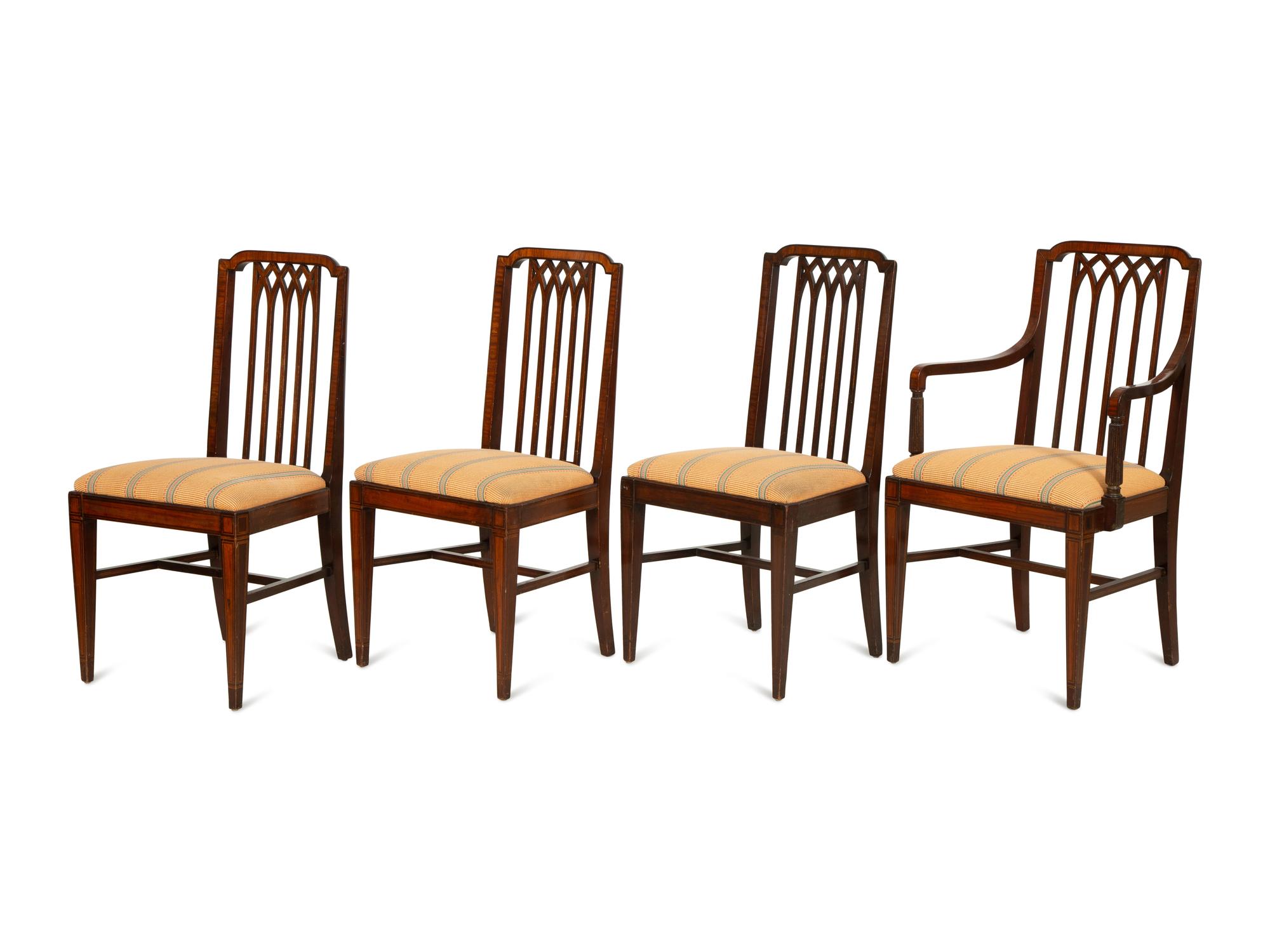 A Set of Eight George III Gothic Style Mahogany Dining Chairs