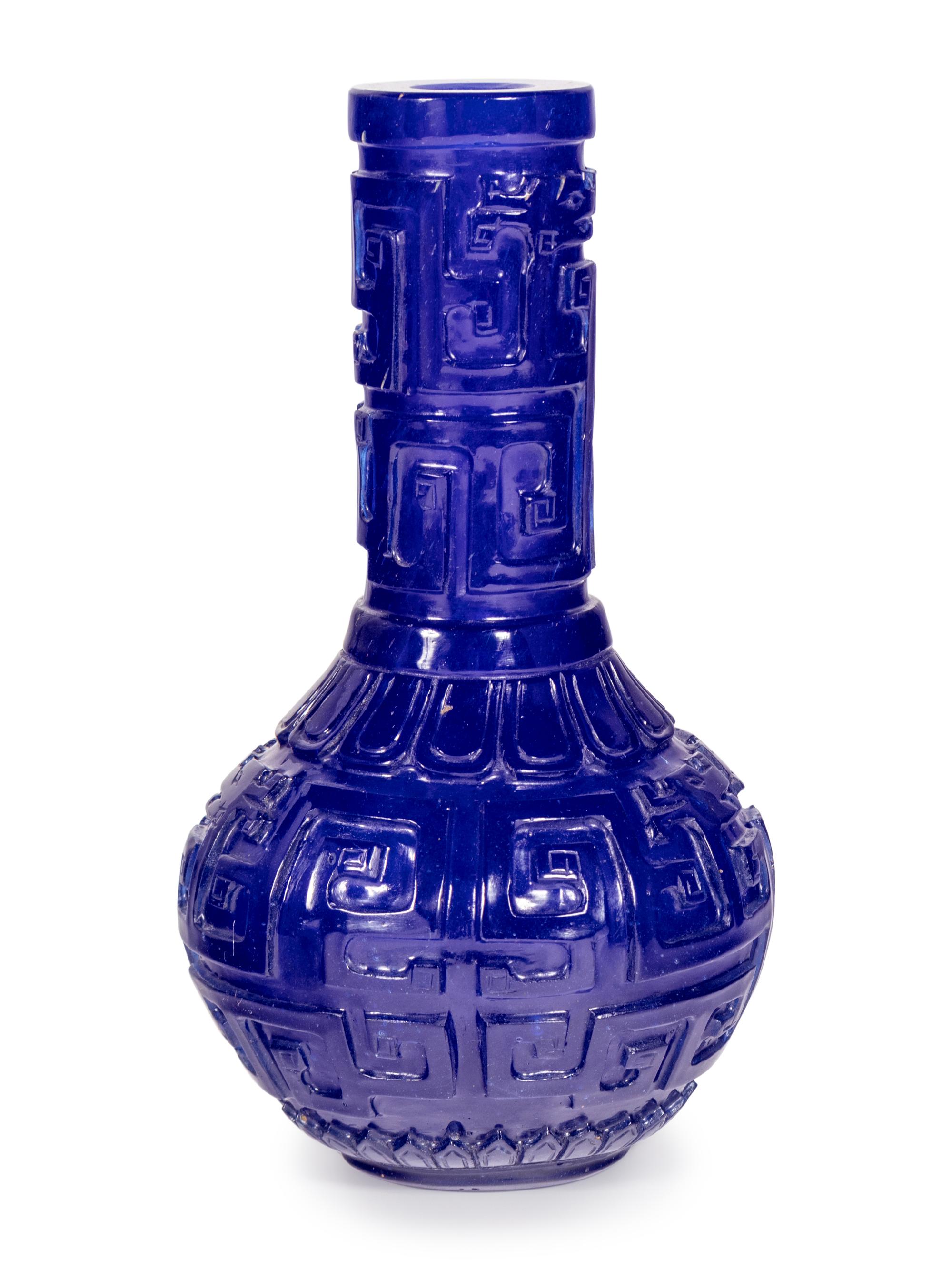 A Chinese Carved Transparent Sapphire Blue Glass Bottle Vase