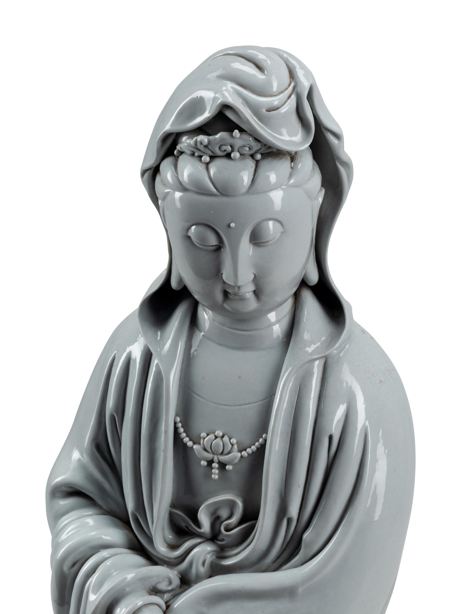 A Large Blanc de Chine Figure of Guanyin