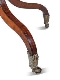 A Regency Rosewood and Mahogany Flip-Top Table