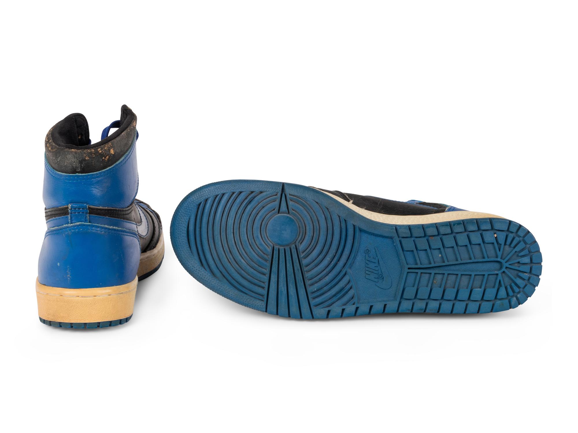 A Pair of Original 1985 Nike Air Jordan 1 Basketball Shoes