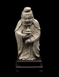 A Chinese Burnt Jade Figure of a Foreigner