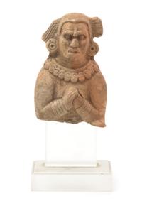 A Meso-American Ceramic Fragment Height 4 1/2 inches.