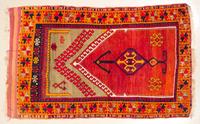 A Wool Prayer Rug 4 feet 6 inches x 3 feet 5 1/2 inches.