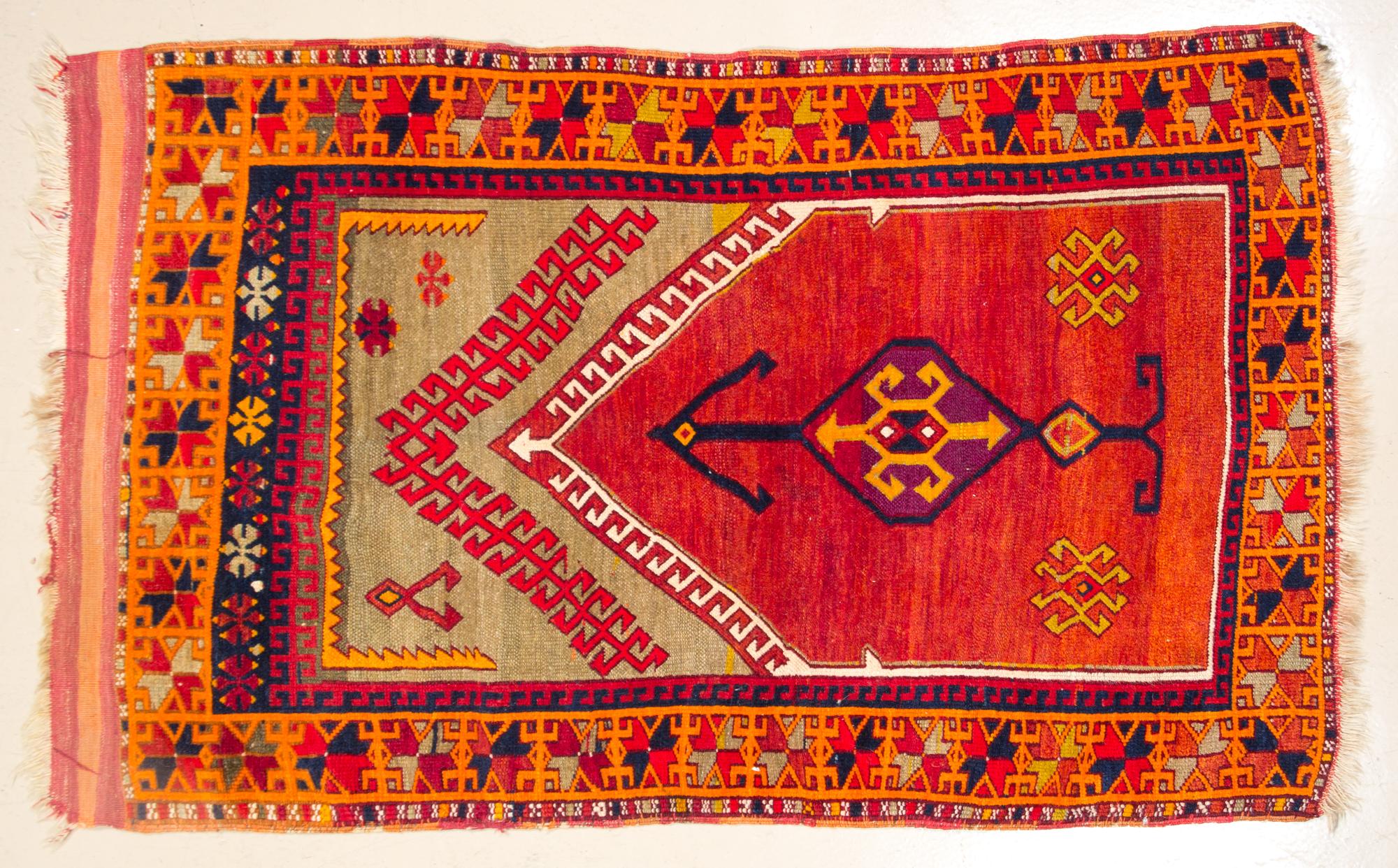 A Wool Prayer Rug 4 feet 6 inches x 3 feet 5 1/2 inches.