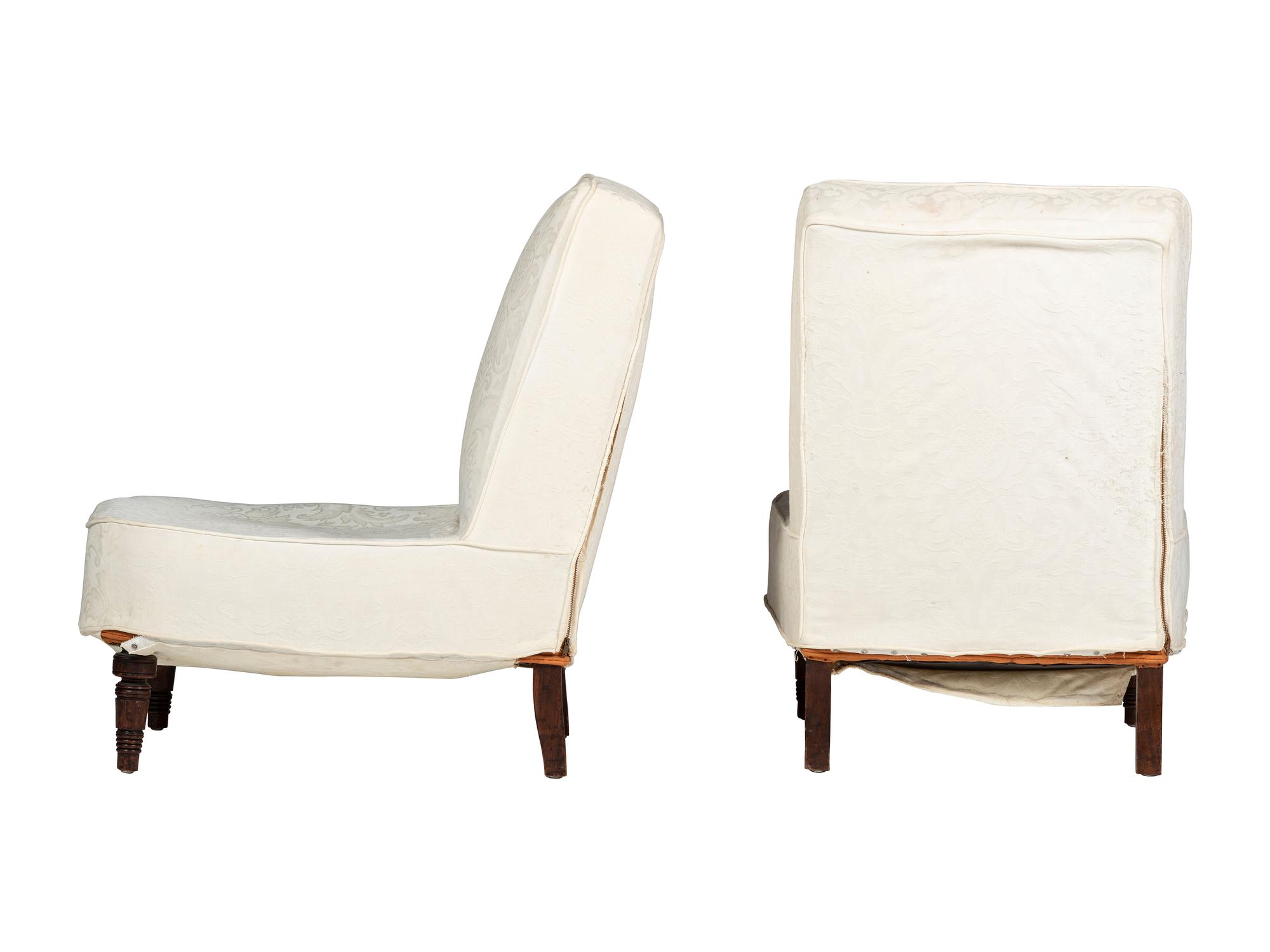 A Pair of Victorian Walnut Slipper Chairs