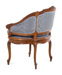 A Louis XV Style Walnut Bergère de Bureau