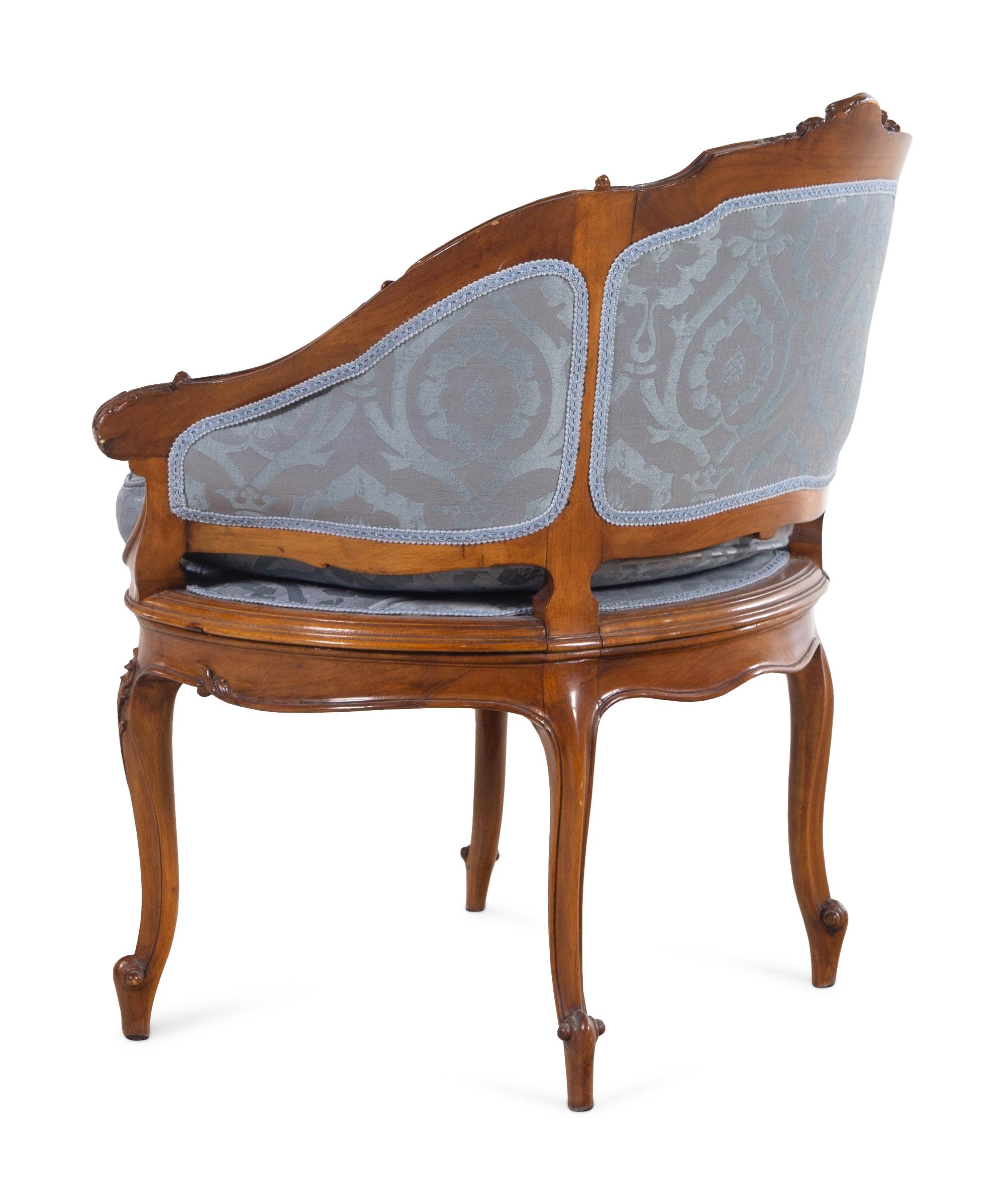 A Louis XV Style Walnut Bergère de Bureau