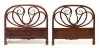 An Art Nouveau Bentwood Bed Width 37 inches.