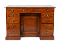 An English Mahogany Kneehole Desk — LATE 19TH CENTURY