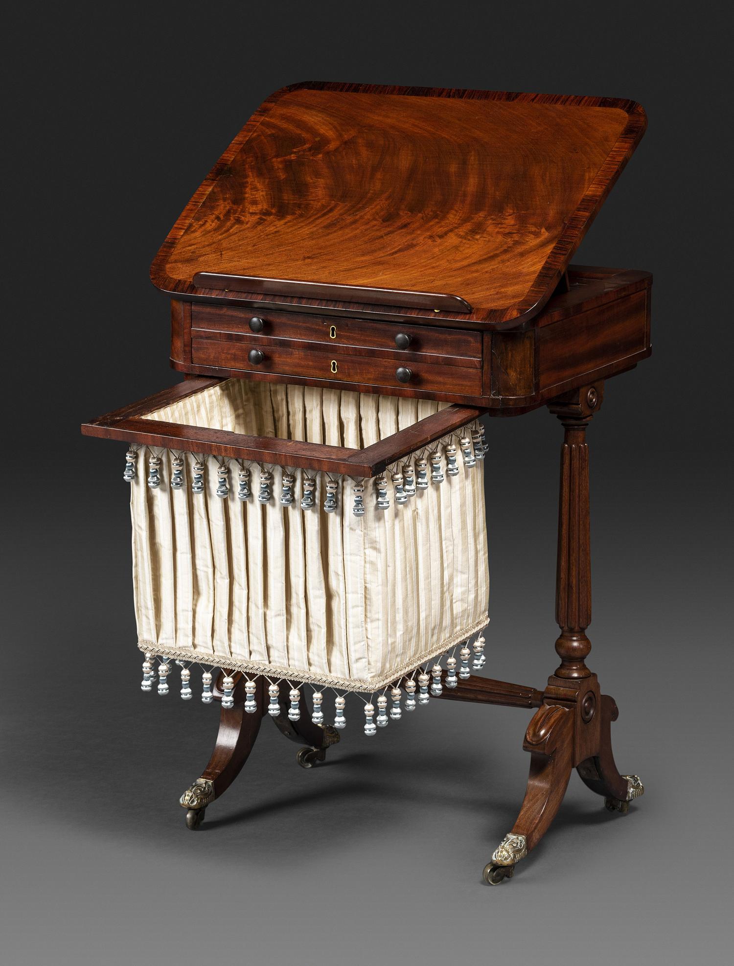 A Classical Figured Mahogany and Rosewood Veneered Sewing Table