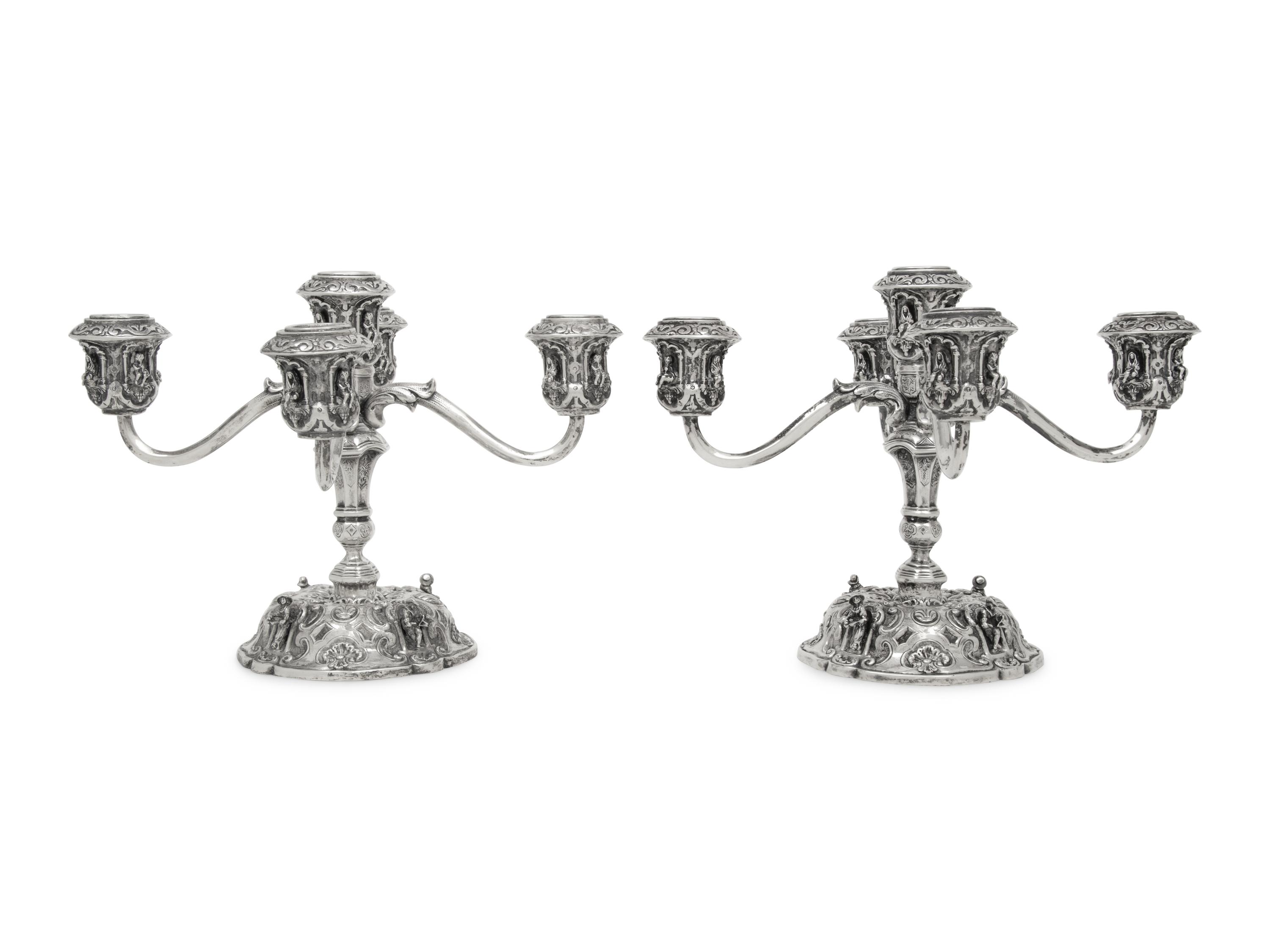 A Pair of German Silver Five-Light Candelabra