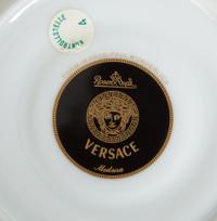 A Versace Porcelain Medusa Red Dinner Service